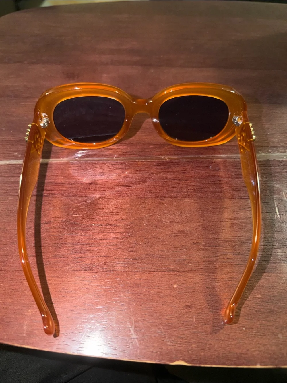 Loewe Orange Oval Sunglasses with Black Lenses